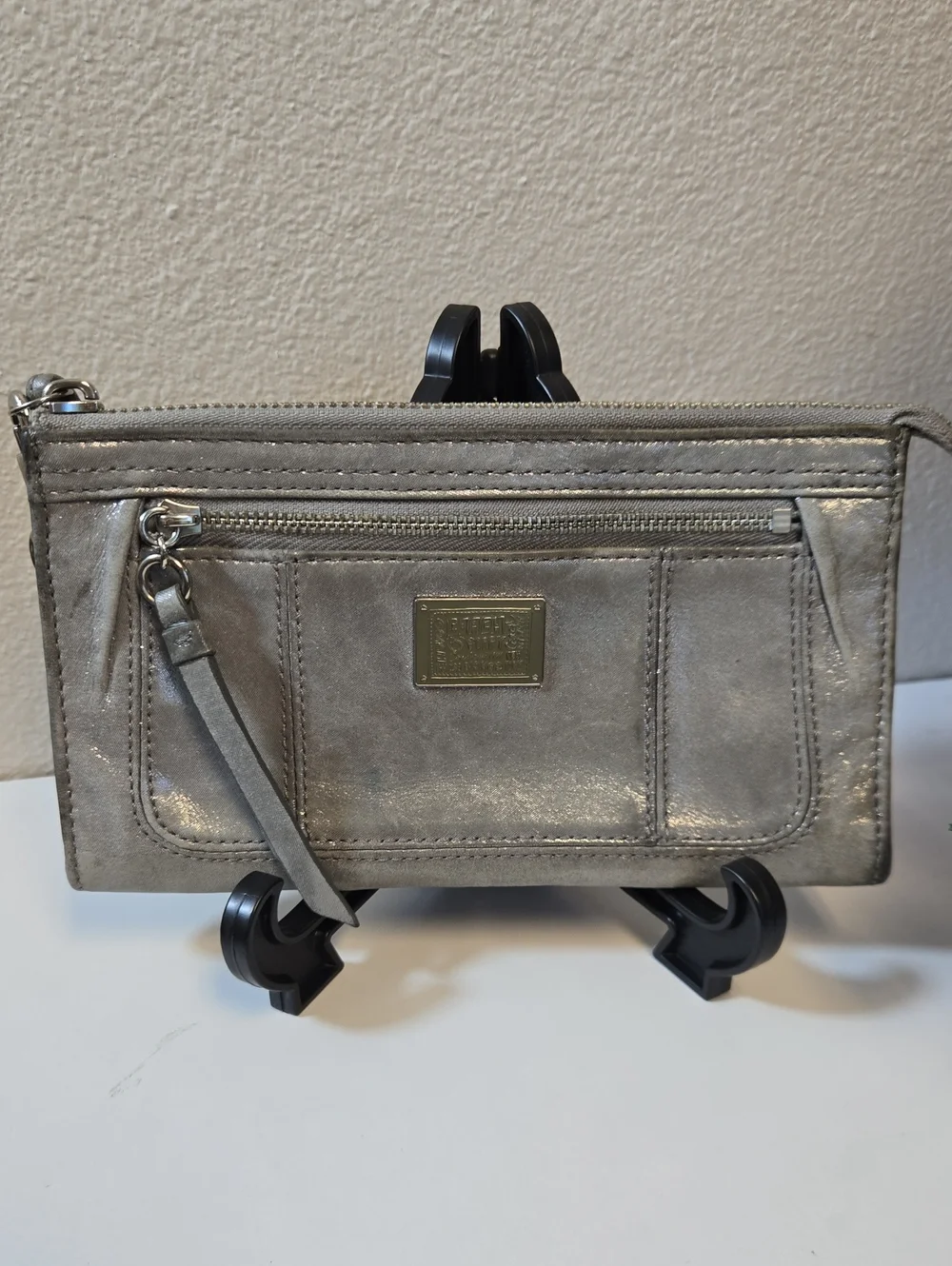 Pre-loved Coach Poppy Silver Metallic Wristlet Clutch